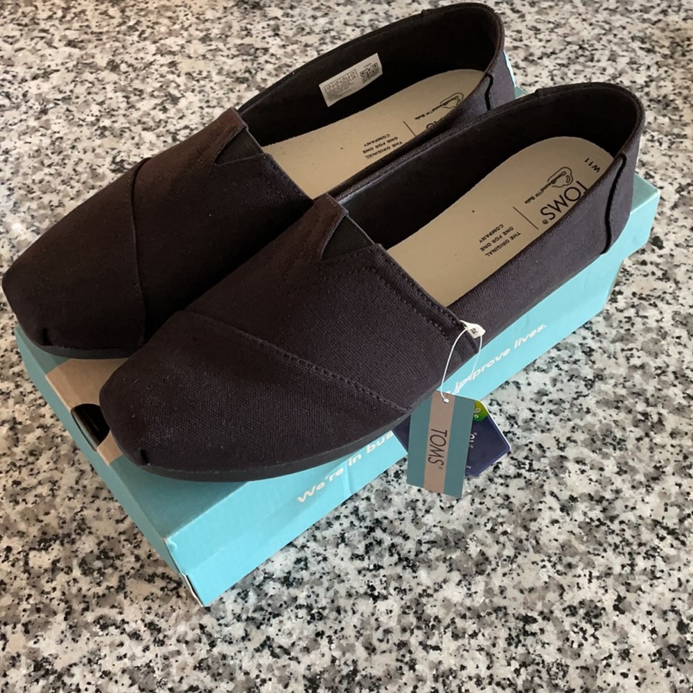 Black TOMS Alpargata shoes